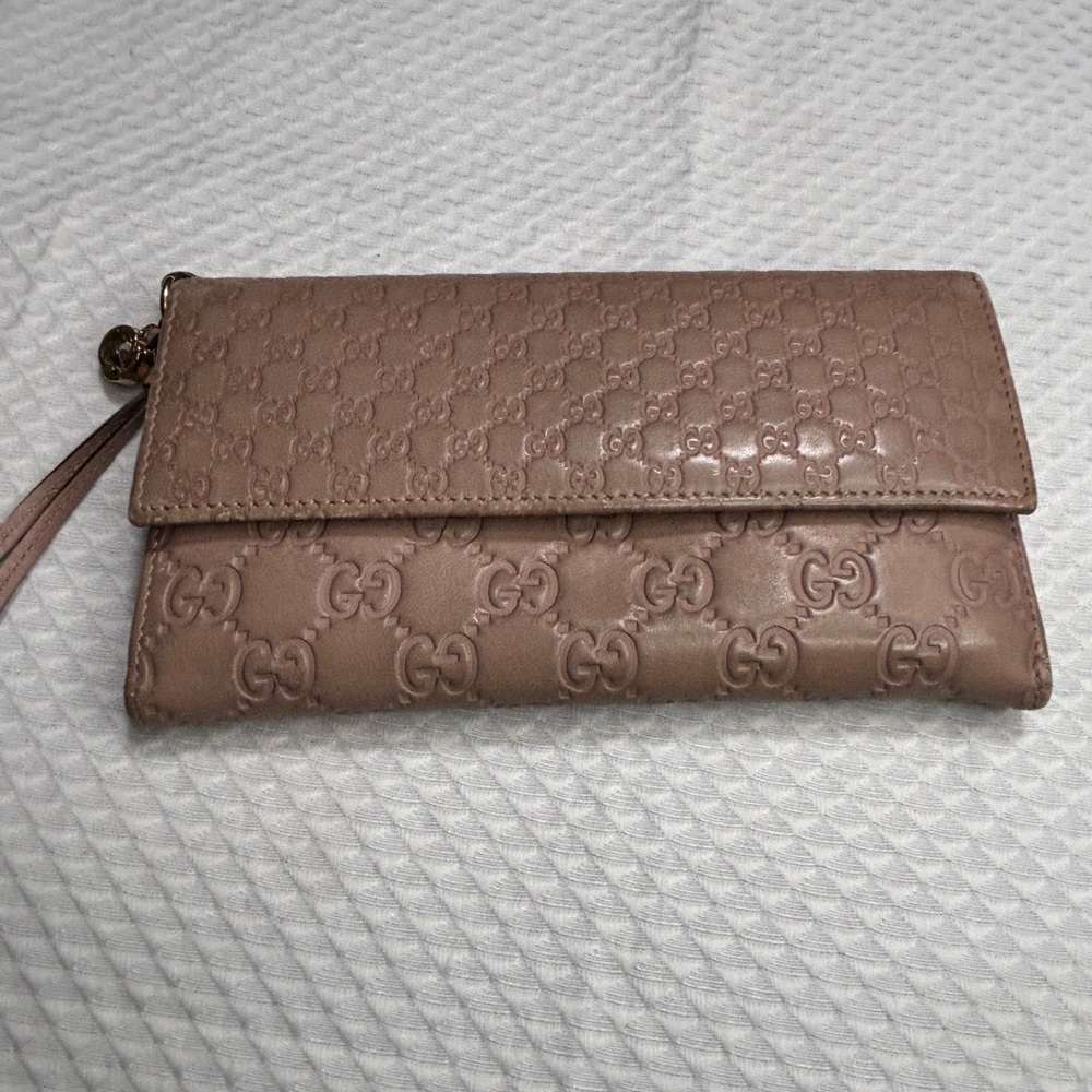 Gucci Mauve Embossed Wallet